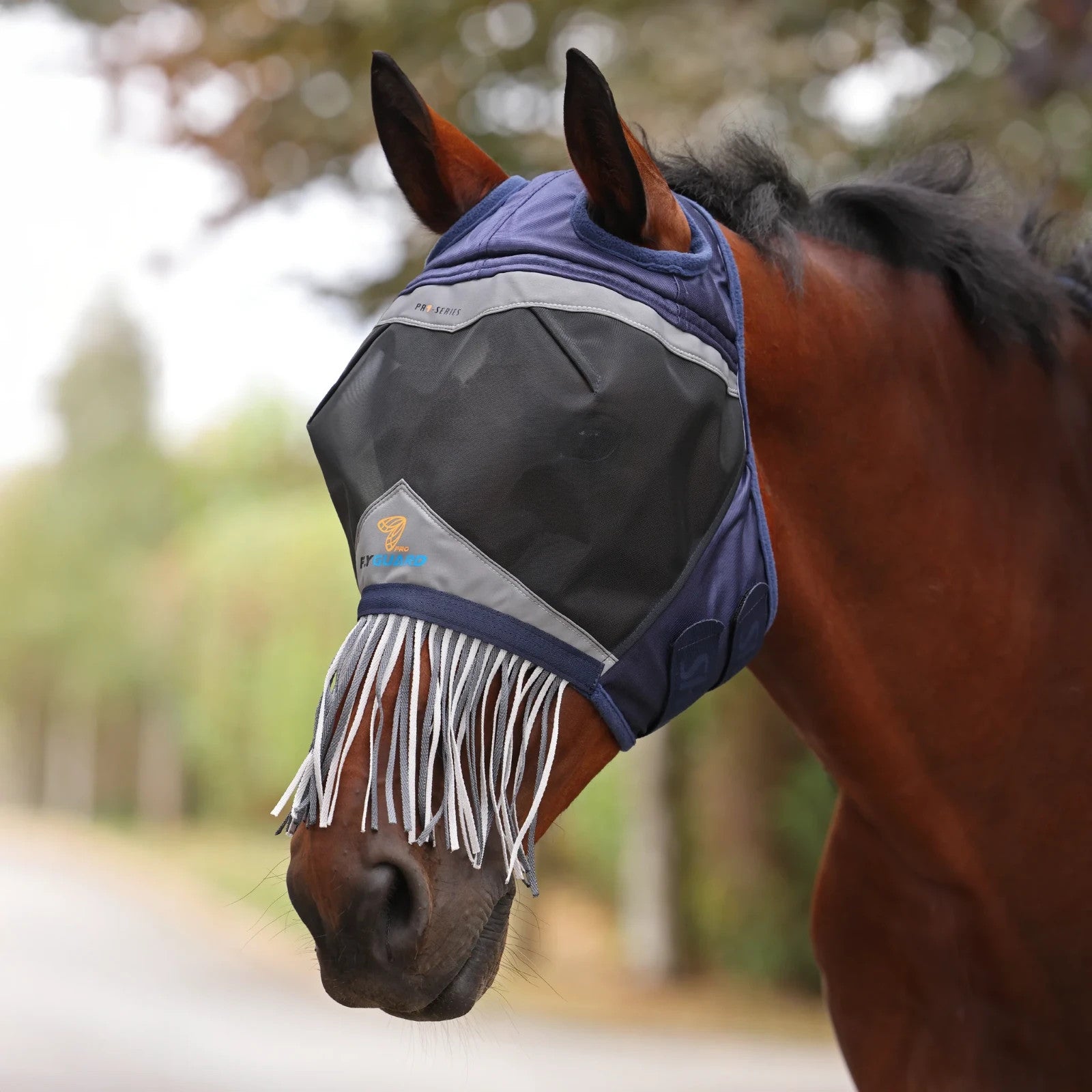Picture of Shires FlyGuard Pro Fine Mesh Fly Mask with Ear Holes & Nose Fringe, UV 2 Colour