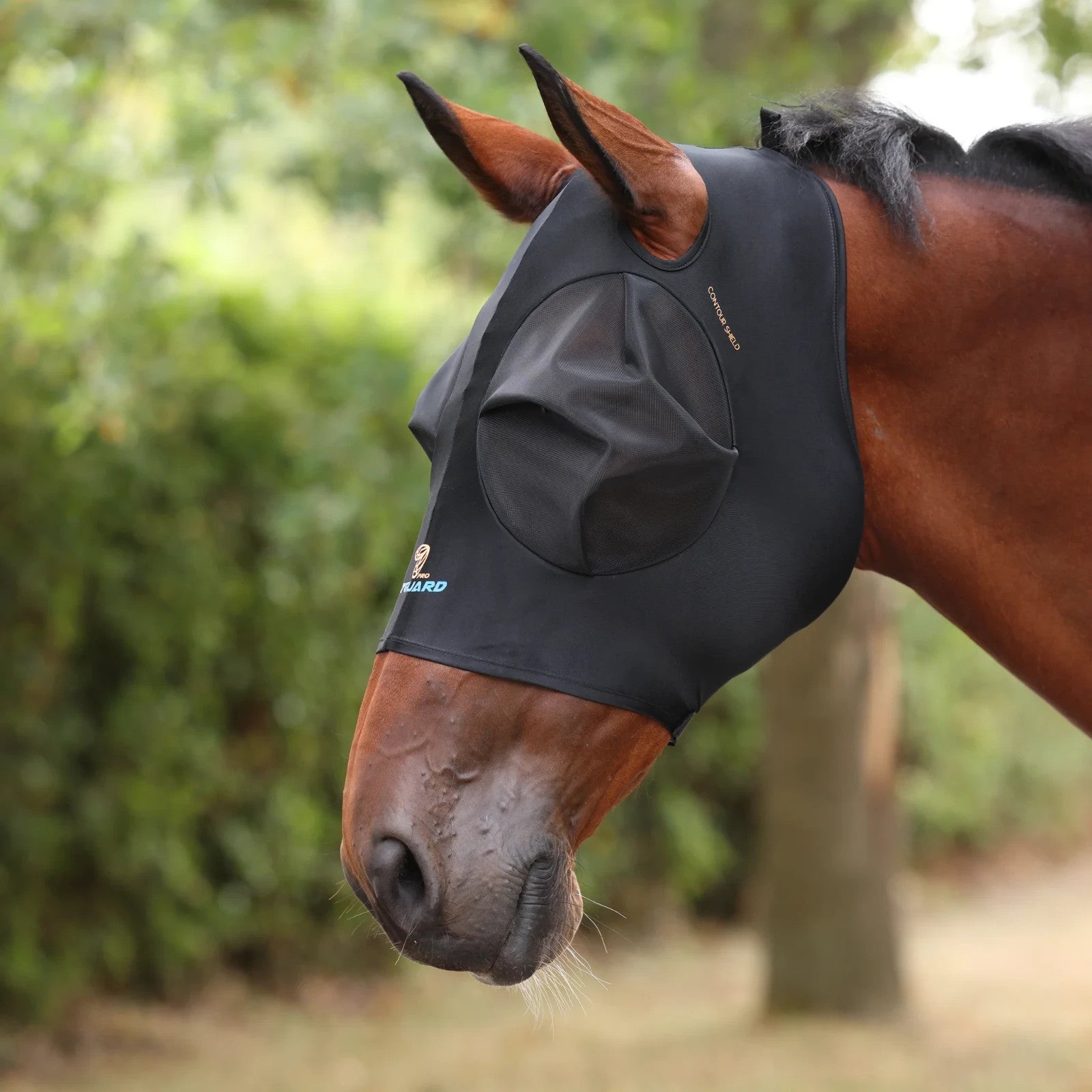 Picture of Shires FlyGuard Pro Stretch Fly Mask with Ear Holes, UV Protection, Black